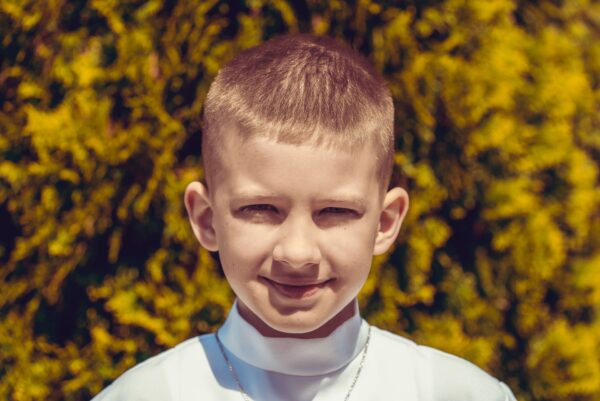 pierwsza komunia swieta w kosciele jana pawla ii podsarnie 2024 0052